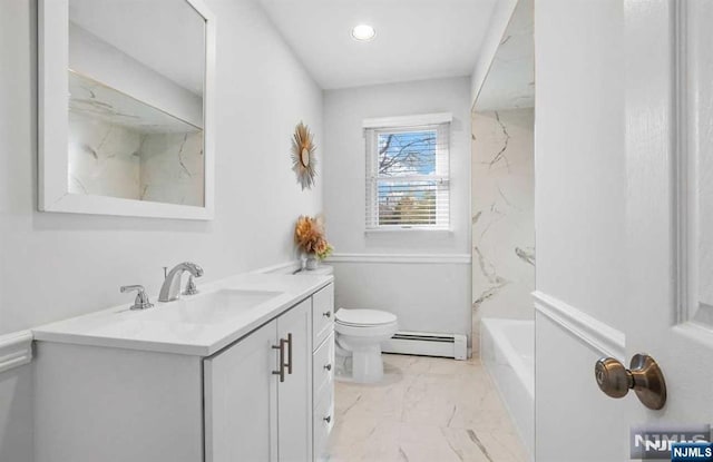 full bathroom featuring vanity, a baseboard heating unit,  shower combination, and toilet