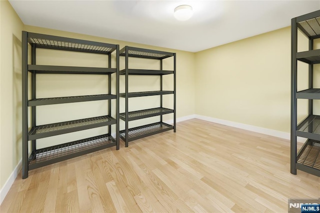 basement with light wood-type flooring