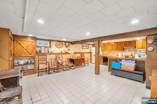 interior space featuring white fridge