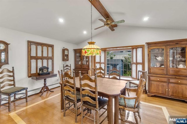 dining room with vaulted ceiling with beams, ceiling fan, and light hardwood / wood-style flooring