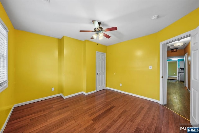 unfurnished bedroom featuring hardwood / wood-style floors and ceiling fan