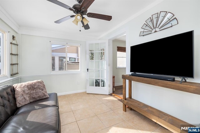 tiled living room featuring ceiling fan