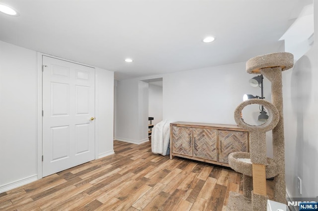 sitting room with light hardwood / wood-style floors