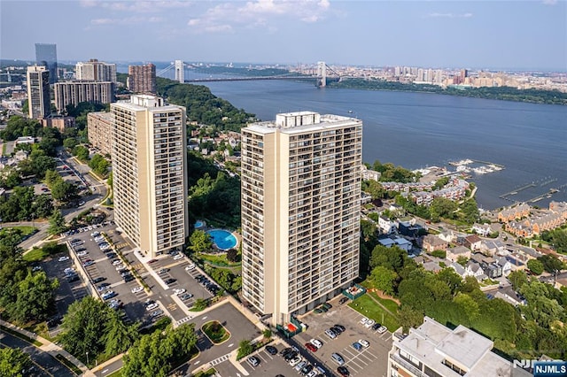 bird's eye view featuring a water view and a city view