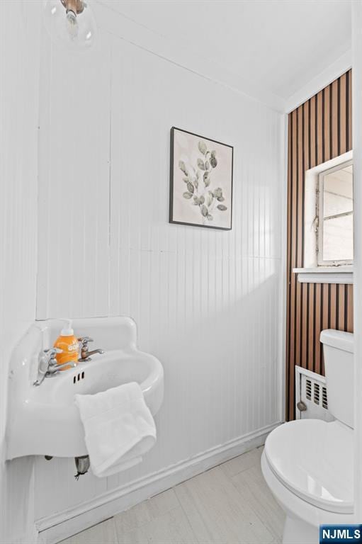 bathroom with toilet and sink