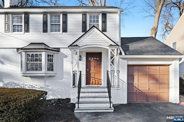 view of front of house with a garage