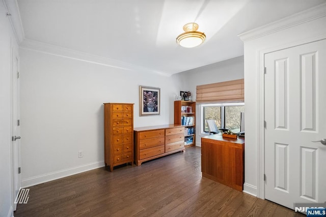 office space featuring crown molding and dark hardwood / wood-style floors