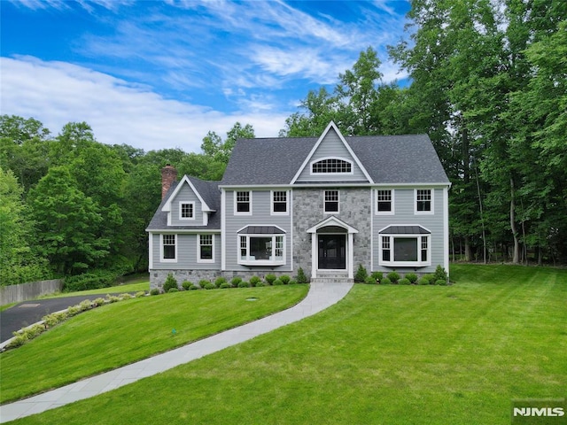 view of front of house with a front lawn