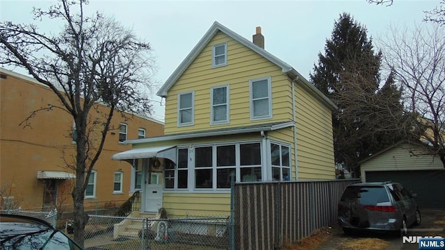 view of front of property featuring a garage