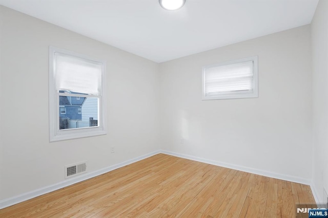 empty room featuring light hardwood / wood-style flooring