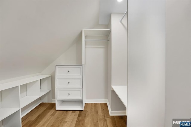 walk in closet featuring light wood-type flooring