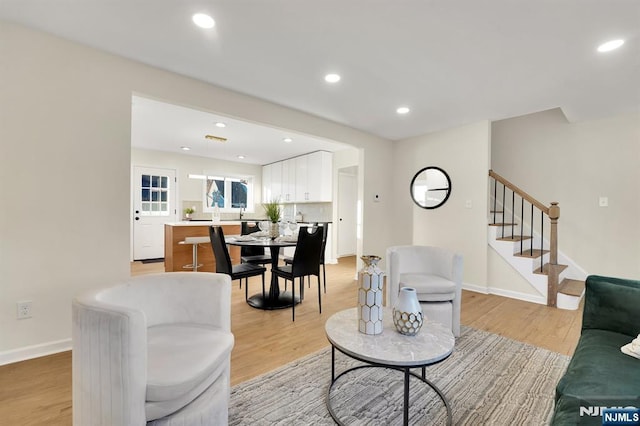 living room featuring light wood-type flooring