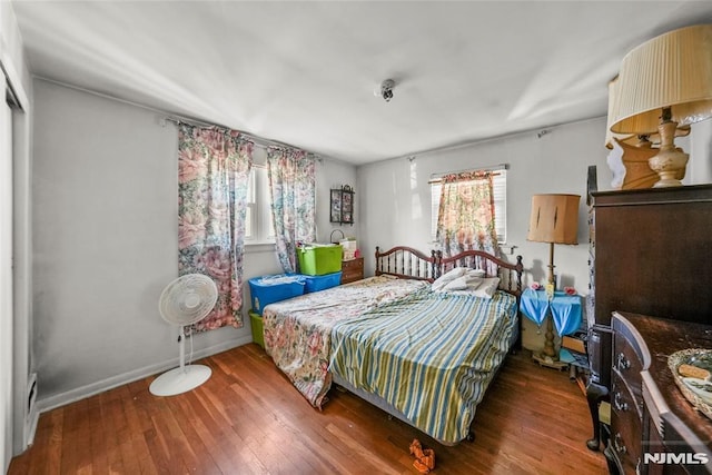 bedroom featuring wood-type flooring