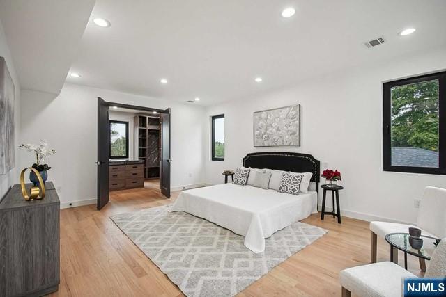 bedroom featuring light wood-type flooring