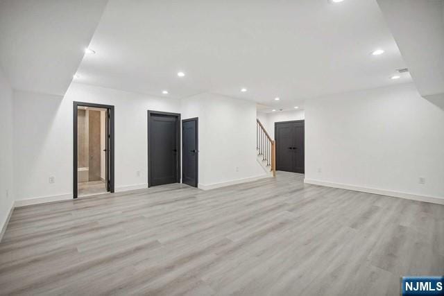 unfurnished room featuring light hardwood / wood-style flooring