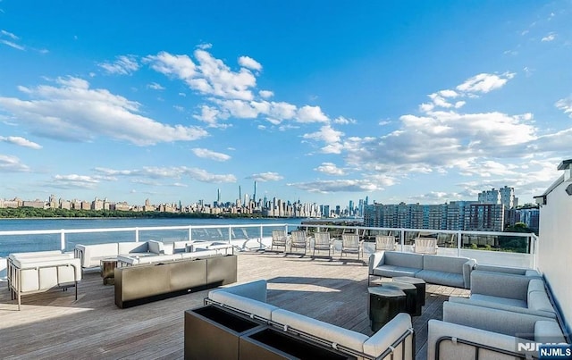 exterior space with a water view and an outdoor hangout area