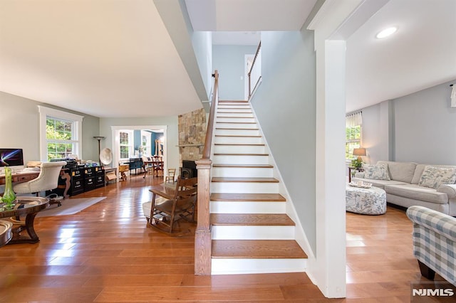 staircase featuring hardwood / wood-style floors