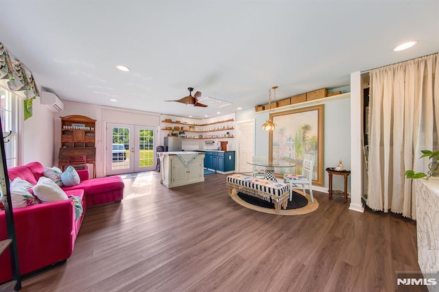 living room featuring french doors, ceiling fan, a wall mounted air conditioner, and dark hardwood / wood-style flooring