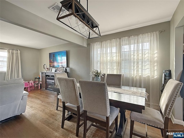 dining area featuring hardwood / wood-style flooring