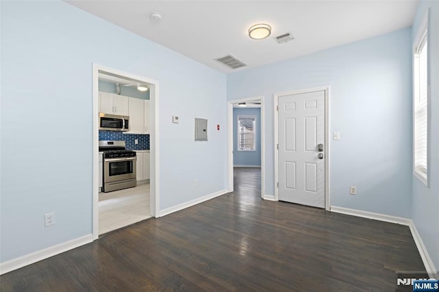 interior space with dark wood-type flooring