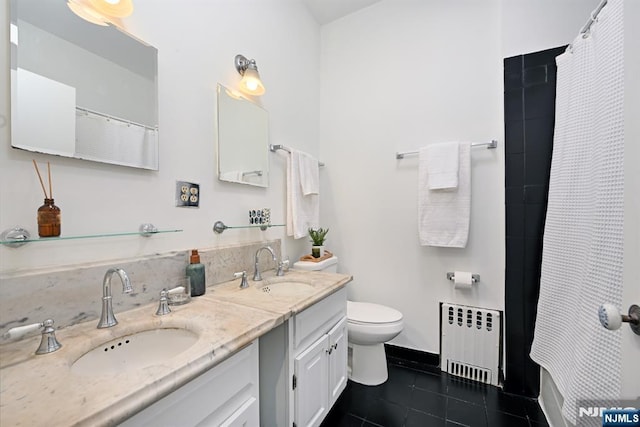 bathroom with toilet, a shower with curtain, radiator heating unit, vanity, and tile patterned flooring