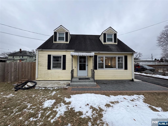 view of new england style home