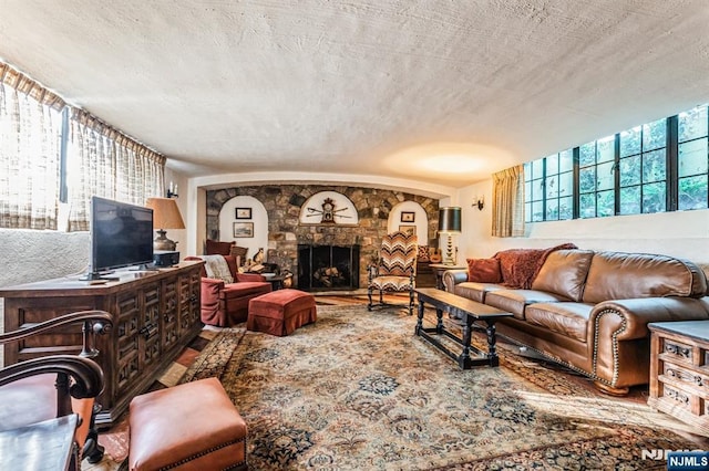 living room featuring hardwood / wood-style floors and a fireplace