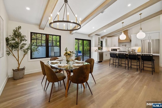 dining space with light wood-type flooring, a chandelier, recessed lighting, and baseboards