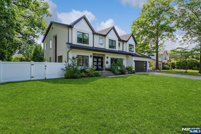 view of front of property with a front lawn