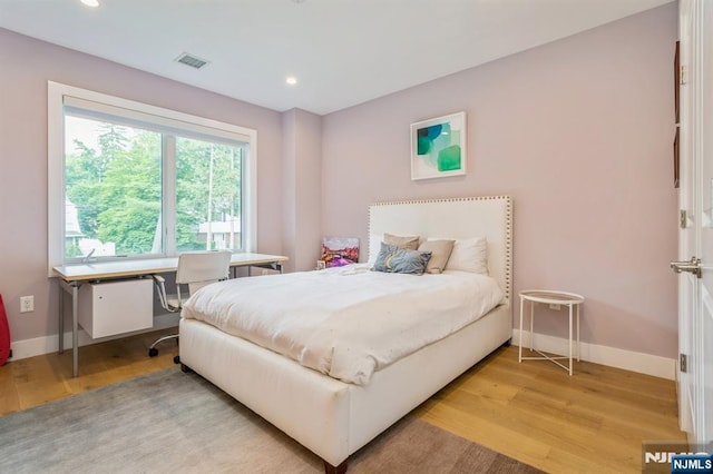 bedroom featuring light hardwood / wood-style flooring