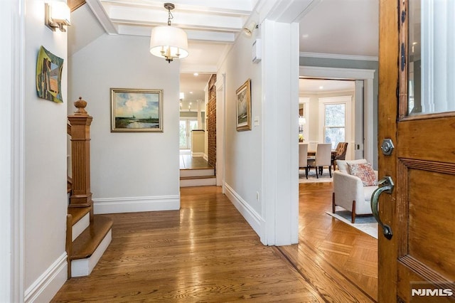 hall featuring crown molding and beam ceiling