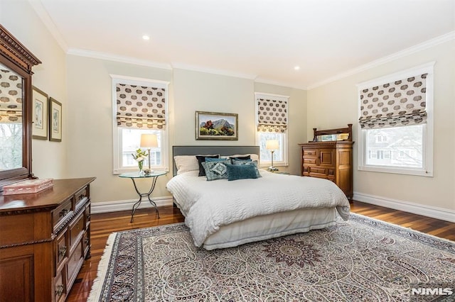 bedroom with ornamental molding and hardwood / wood-style floors