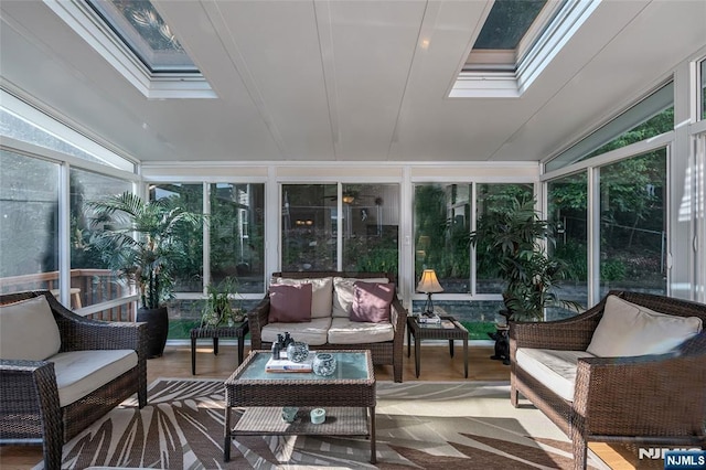 sunroom / solarium featuring a skylight