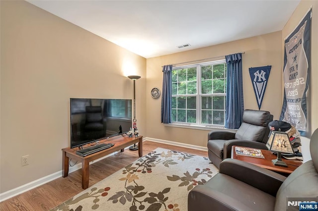 living room with hardwood / wood-style floors