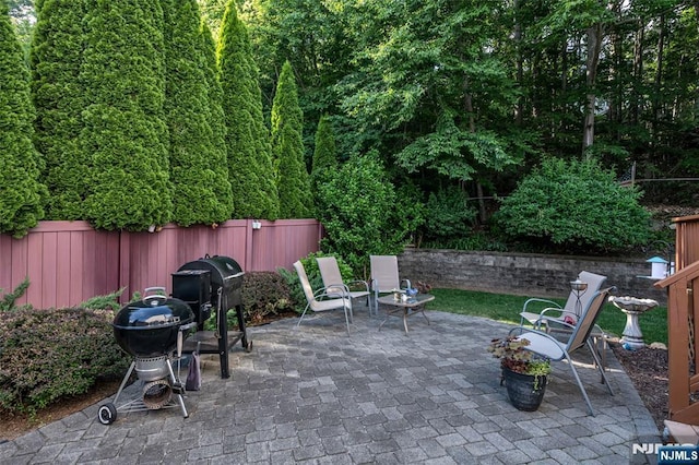 view of patio featuring a grill