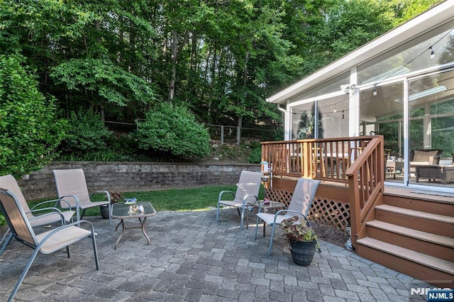 view of patio with a deck