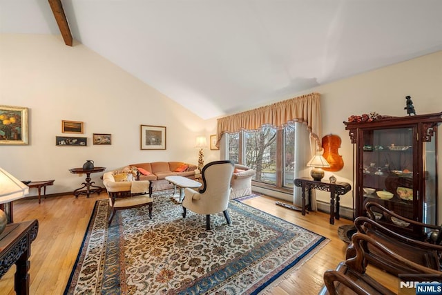 living room featuring beam ceiling, light hardwood / wood-style flooring, and high vaulted ceiling