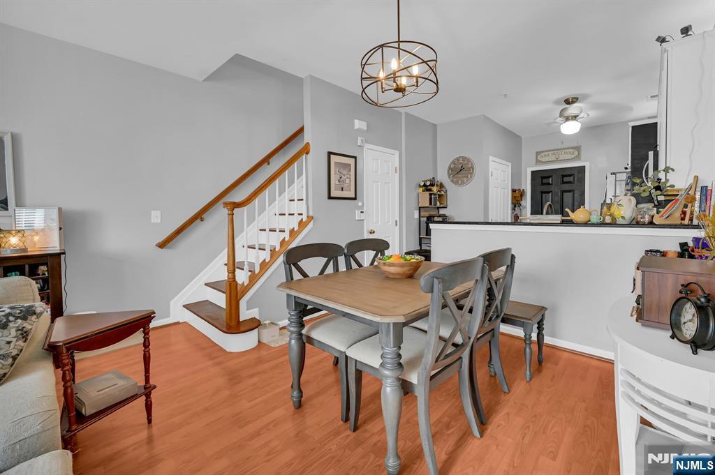 dining space featuring ceiling fan and light hardwood / wood-style floors