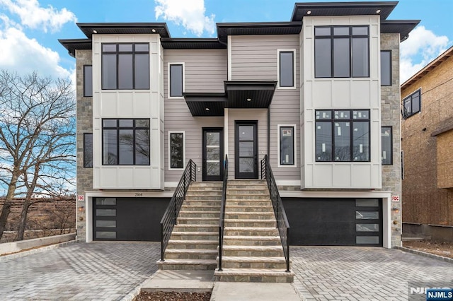 modern home featuring a garage