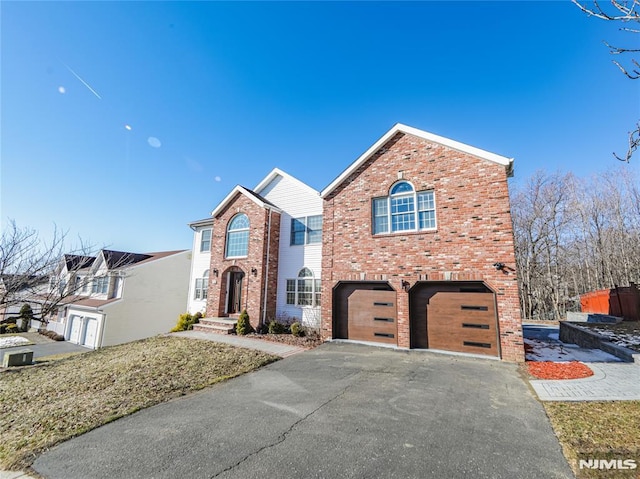 front of property featuring a garage