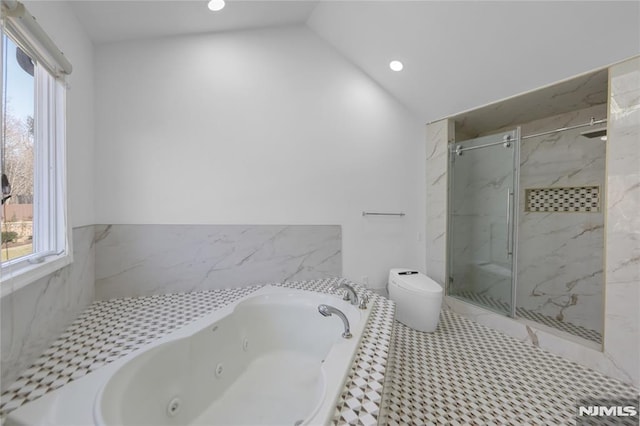 bathroom with vaulted ceiling, toilet, and separate shower and tub