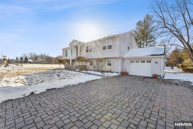 view of front of home with a garage