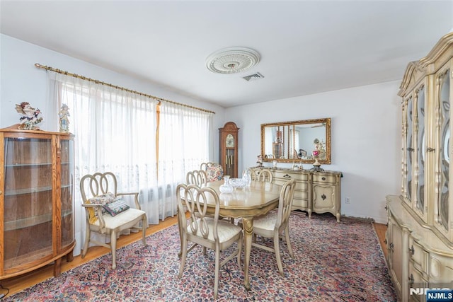 dining room with light wood-type flooring