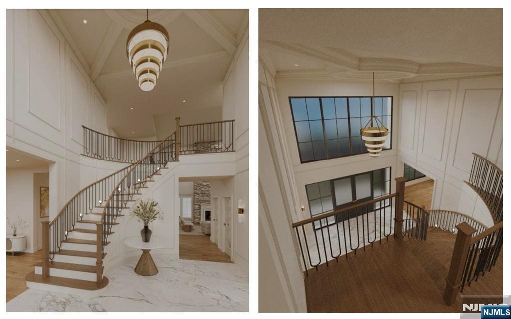 staircase featuring a stone fireplace, a high ceiling, coffered ceiling, marble finish floor, and crown molding