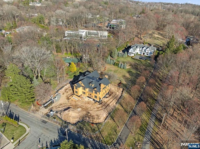bird's eye view featuring a forest view