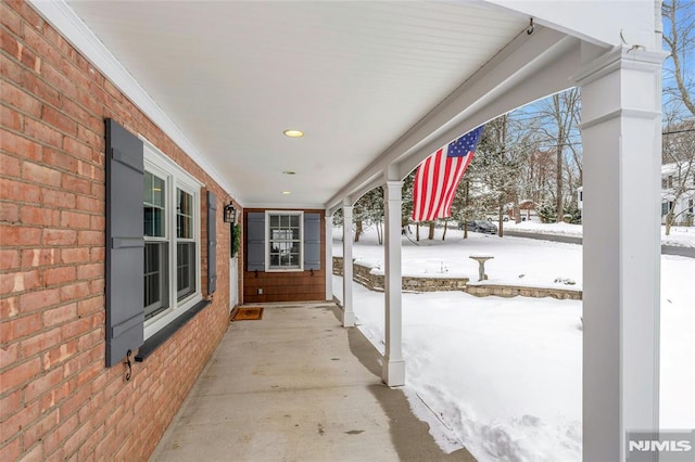 view of snow covered patio