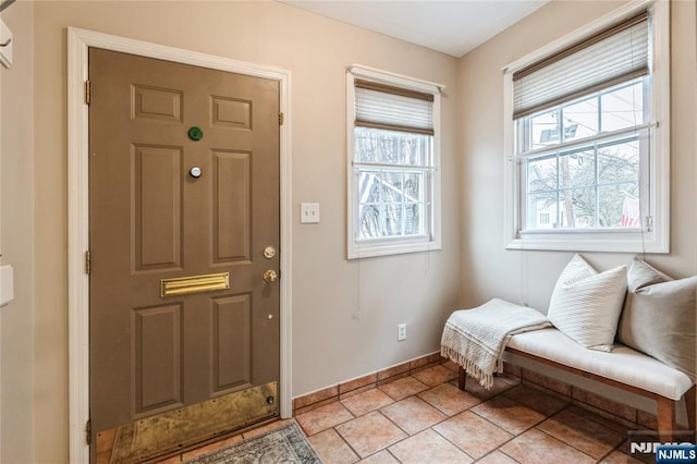 view of tiled foyer entrance