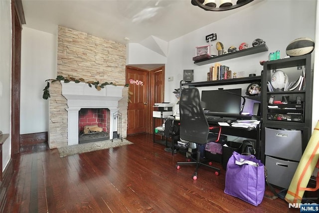 office area featuring hardwood / wood-style flooring and a fireplace