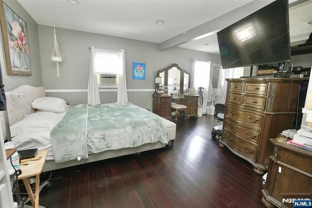 bedroom with hardwood / wood-style flooring and cooling unit