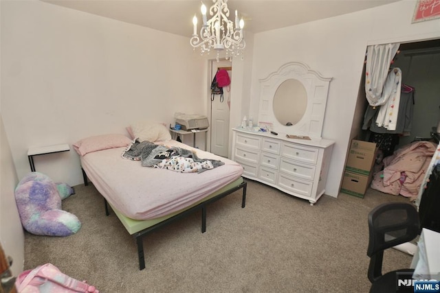 carpeted bedroom featuring a notable chandelier